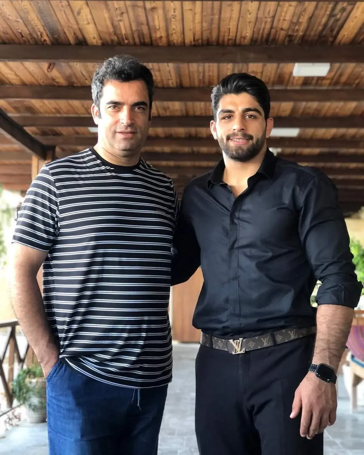 صمیمیت خاص منوچهر هادی با قهرمان المپیک/ عکس