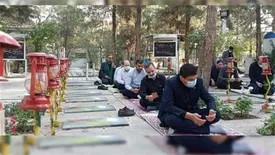 تجلیل کارکنان بیمه کوثر از شهدای دفاع مقدس