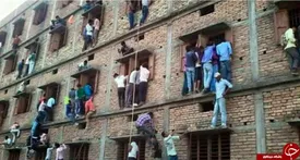 تقلب کنکوری به روش اسپایدرمن!/ عکس