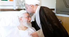 چرا حسن روحانی در مراسم تشییع رهبر شهید نبود؟