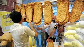 جلب توجه بنر نانوایی یک شهرستان درباره اتباع