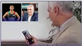 تبریک نائب قهرمانی مسابقات جهانی کشتی به رضا اطری توسط مدیر عامل پست بانک ایران در ارتباط تلفنی