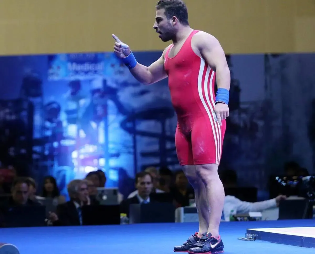 دلیل حذف کیانوش رستمی از مسابقات جهانی وزنه‌برداری