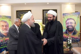 حسن روحانی در منزل شهید علی لاریجانی/ تصاویر