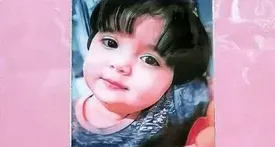 سنگ مزار دختر کاپشن صورتی/عکس