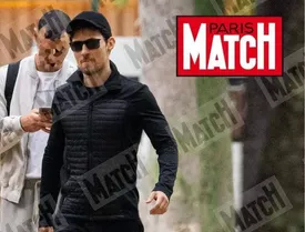 پاول دروف در خیابانهای پاریس پس از دستگیری/ عکس